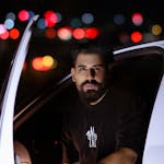 Focused Man Behind the Wheel